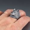 sterling silver wolf head ring on hand