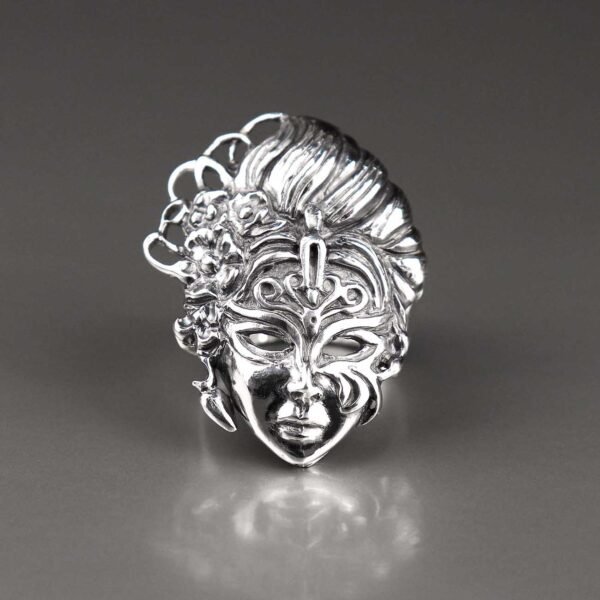 Handcrafted sterling silver mask ring with floral details, bold statement jewelry for women