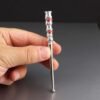 Cigarette holder for slim cigarettes with coral cabochones