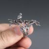 Sterling silver tree ring with a bird