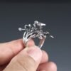 Sterling silver tree ring with a bird