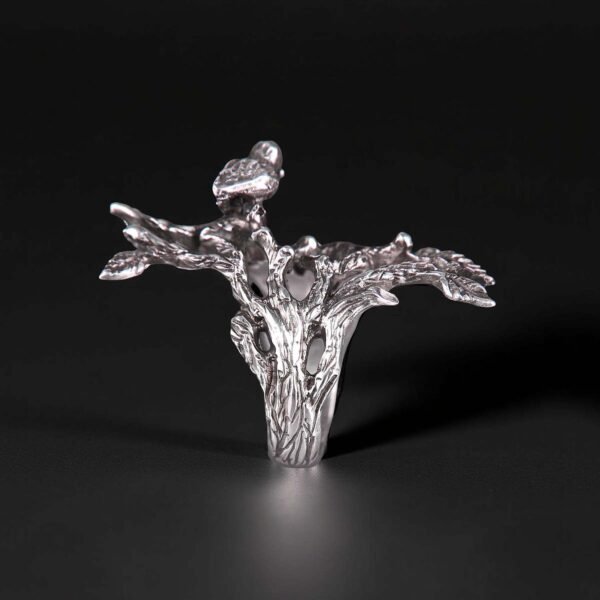 Sterling silver tree ring with a bird