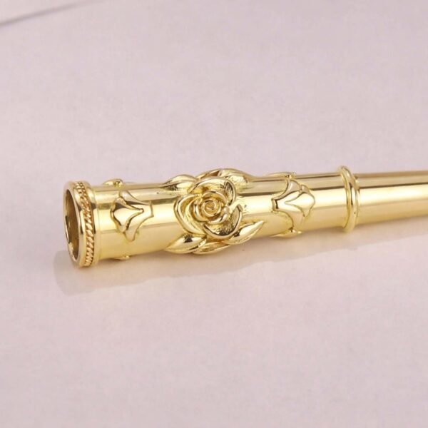 Gold brass cigarette holder with rose engraving on black velvet - Hover Jewelry