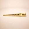 Close-up of hand-engraved rose motif on gold cigarette holder