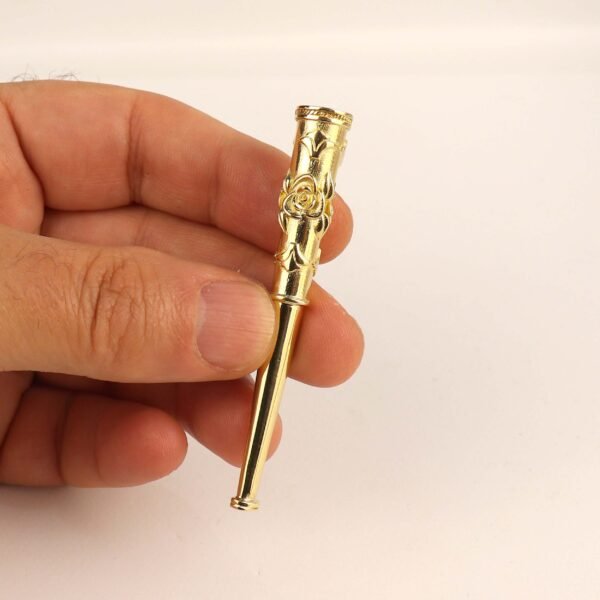 Ornate gold vintage cigarette holder held in hand — Hover Jewelry luxury smoking accessory