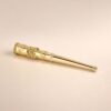 Close-up of hand-engraved rose motif on gold cigarette holder