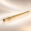 Brass cigarette holder with polished gold-tone Celtic knot ornament